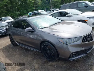 2018 Acura TLX w/A-SPEC Pkg with VIN 19UUB2F6XJA012074, listed as a IAAI auction lot 42415187 with 77,091 mi miles and . Bid and sale history available at DreamBid. Image 1.