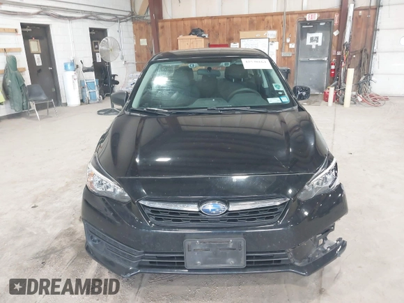 2021 Subaru Impreza with VIN 4S3GKAB64M3601075, listed as a IAAI auction lot 42530164 with 90,522 mi miles and . Bid and sale history available at DreamBid. Image 13.