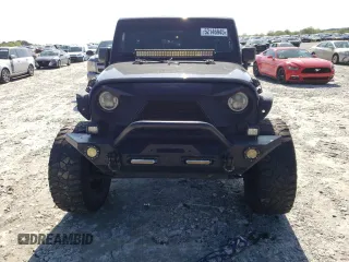 2013 Jeep Wrangler Unlimited Moab with VIN 1C4HJWEG7DL600043, listed as a Copart auction lot 52146945 with 118,882 mi miles and Salvage title. Bid and sale history available at DreamBid. Image 5.