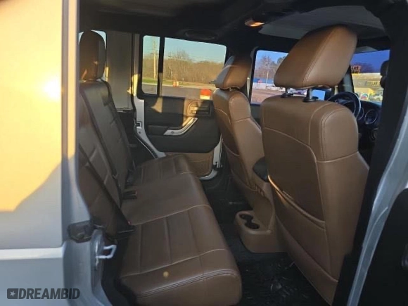 2011 Jeep Wrangler Unlimited Sahara with VIN 1J4BA5H16BL627992, listed as a Copart auction lot 54337305 with 197,845 mi miles and Clean Title. Bid and sale history available at carsss.com. Image 6.
