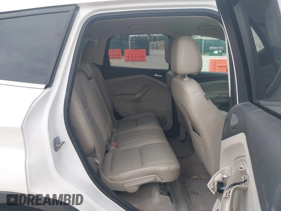 2014 Ford Escape SE with VIN 1FMCU9GX2EUA62133, listed as a IAAI auction lot 42342688 with Not provided miles and . Bid and sale history available at DreamBid. Image 8.