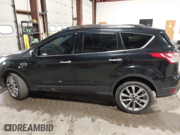 2015 Ford Escape SE with VIN 1FMCU9G9XFUA70029, listed as a IAAI auction lot 41673827 with 82,043 mi miles. Bid and sale history available at carsss.com. Image 15.