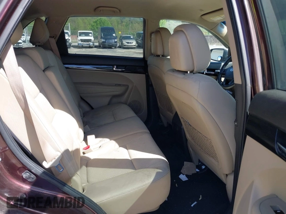 2012 Kia Sorento LX with VIN 5XYKTCA64CG279195, listed as a IAAI auction lot 42144679 with 116,690 mi miles. Bid and sale history available at carsss.com. Image 8.