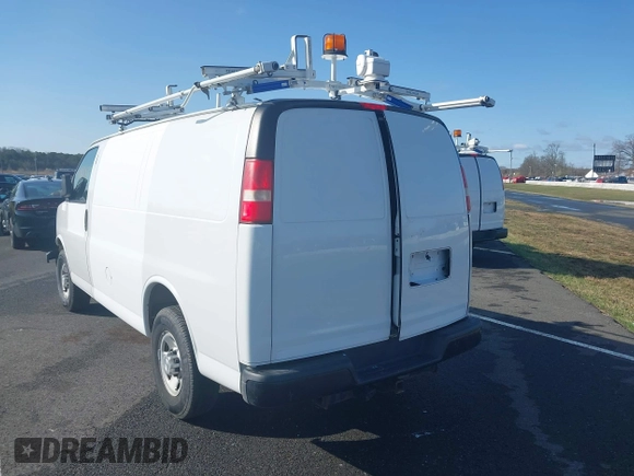 2015 Chevrolet Express Cargo with VIN 1GCWGFCF1F1161498, listed as a IAAI auction lot 41878871 with 157,365 mi miles. Bid and sale history available at carsss.com. Image 3.