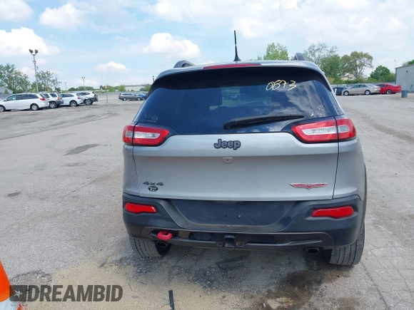2015 Jeep Cherokee Trailhawk z VIN 1C4PJMBS5FW615313, wystawiony jako IAAI lot #42250873 z przebiegiem 148 008 mil mil oraz . Historia ofert i sprzedaży dostępna na DreamBid. Obrazek 16.