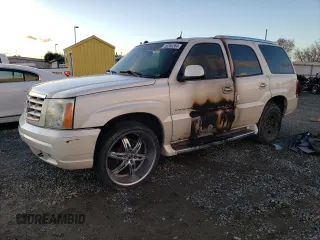 2004 Cadillac Escalade z VIN 1GYEK63N64R200175, wystawiony jako Copart lot #86566364 z przebiegiem Nie podano mil oraz Szkoda całkowita • Salvage title. Historia ofert i sprzedaży dostępna na DreamBid. Obrazek 1.