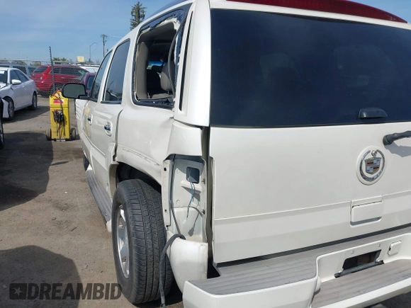 2005 Cadillac Escalade z VIN 1GYEC63N25R200026, wystawiony jako IAAI lot #41761210 z przebiegiem 226 747 mil mil oraz . Historia ofert i sprzedaży dostępna na DreamBid. Obrazek 19.