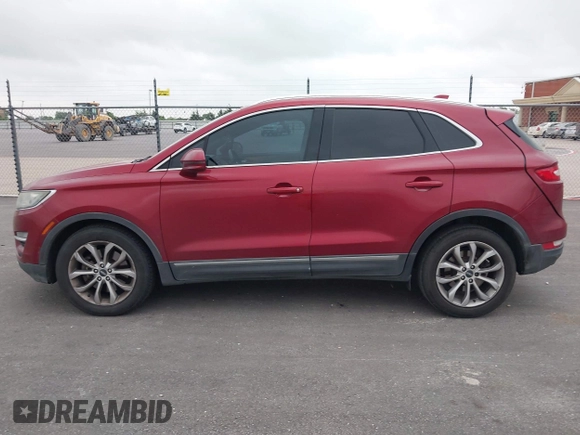 2015 Lincoln MKC with VIN 5LMCJ1A97FUJ30994, listed as a IAAI auction lot 42159219 with 180,802 mi miles. Bid and sale history available at carsss.com. Image 14.