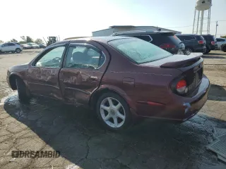 2001 Nissan Maxima SE 20th Anniversary. z VIN JN1CA31A31T314926, wystawiony jako Copart lot #69869354 z przebiegiem Nie podano mil oraz Szkoda całkowita • Salvage title. Historia ofert i sprzedaży dostępna na DreamBid. Obrazek 2.