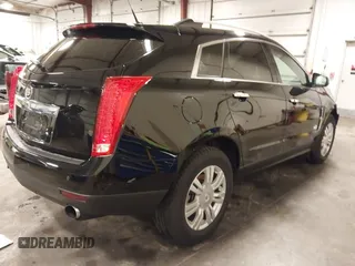 2011 Cadillac SRX Luxury Collection with VIN 3GYFNDEY3BS675672, listed as a IAAI auction lot 41804978 with 148,136 mi miles. Bid and sale history available at carsss.com. Image 4.
