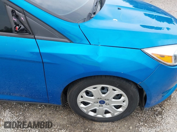 2015 Ford Focus SE z VIN 1FADP3F21FL274182, wystawiony jako IAAI lot #42441161 z przebiegiem 176 810 mil mil oraz . Historia ofert i sprzedaży dostępna na DreamBid. Obrazek 21.
