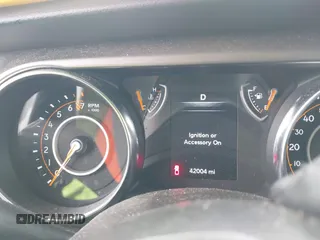 2022 Jeep Gladiator Willys with VIN 1C6HJTAG1NL148524, listed as a IAAI auction lot 41507693 with 42,004 mi miles and . Bid and sale history available at DreamBid. Image 15.