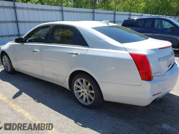 2015 Cadillac CTS Luxury AWD with VIN 1G6AX5SX5F0103725, listed as a IAAI auction lot 42226485 with 112,437 mi miles and . Bid and sale history available at DreamBid. Image 3.