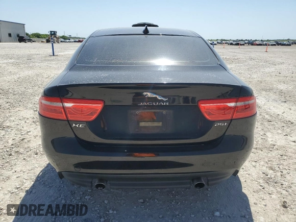 2017 Jaguar XE 25t with VIN SAJAR4BG6HA963018, listed as a Copart auction lot 52345325 with 107,626 mi miles and Salvage Title. Bid and sale history available at DreamBid. Image 6.