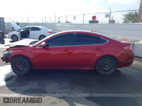 2009 Mazda 6 S Grand Touring with VIN 1YVHP82B795M34101, listed as a IAAI auction lot 41434441 with 125,481 mi miles and . Bid and sale history available at DreamBid. Image 15.