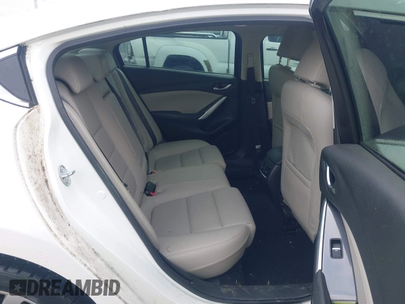 2016 Mazda Mazda6 i Touring with VIN JM1GJ1V56G1448334, listed as a IAAI auction lot 42075222 with 52,883 mi miles. Bid and sale history available at carsss.com. Image 8.