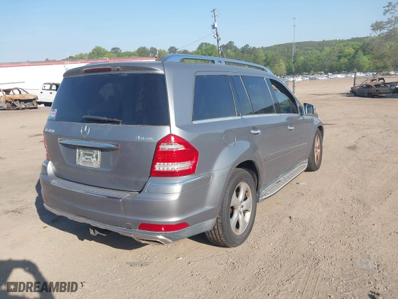 2011 Mercedes-Benz GL-Class GL 450 with VIN 4JGBF7BE8BA671420, listed as a IAAI auction lot 42064096 with 182,622 mi miles. Bid and sale history available at carsss.com. Image 4.