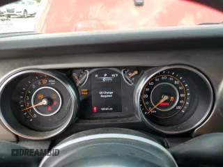 2023 Jeep Gladiator Sport z VIN 1C6HJTAG0PL556855, wystawiony jako Copart lot #57628425 z przebiegiem 18 141 mil mil oraz Szkoda całkowita • Salvage title. Historia ofert i sprzedaży dostępna na DreamBid. Obrazek 9.