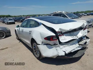 2017 Tesla Model S 100D with VIN 5YJSA1E20HF232570, listed as a IAAI auction lot 42037409 with 68,957 mi miles and . Bid and sale history available at DreamBid. Image 3.