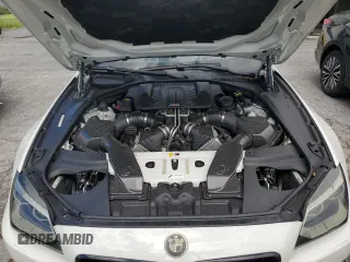 2015 BMW M6 z VIN WBS6C9C52FD467752, wystawiony jako Copart lot #67884554 z przebiegiem 60 729 mil mil oraz Szkody całkowita. Historia ofert i sprzedaży dostępna na DreamBid. Obrazek 11.