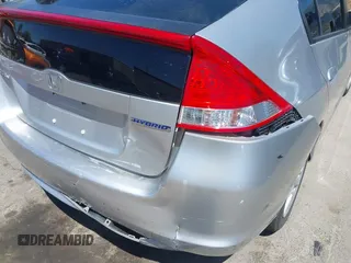 2010 Honda Insight EX with VIN JHMZE2H74AS041533, listed as a IAAI auction lot 42675766 with 203,357 mi miles and . Bid and sale history available at DreamBid. Image 6.