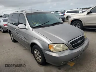 2004 Kia Sedona LX with VIN KNDUP131446570061, listed as a Copart auction lot 74222344 with 0 mi miles and Salvage Title. Bid and sale history available at carsss.com. Image 4.