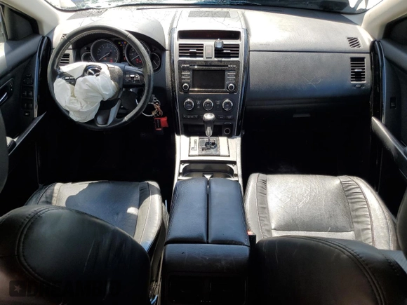 2015 Mazda CX-9 Touring with VIN JM3TB2CA6F0453398, listed as a Copart auction lot 55897115 with 167,563 mi miles and Salvage title. Bid and sale history available at DreamBid. Image 8.