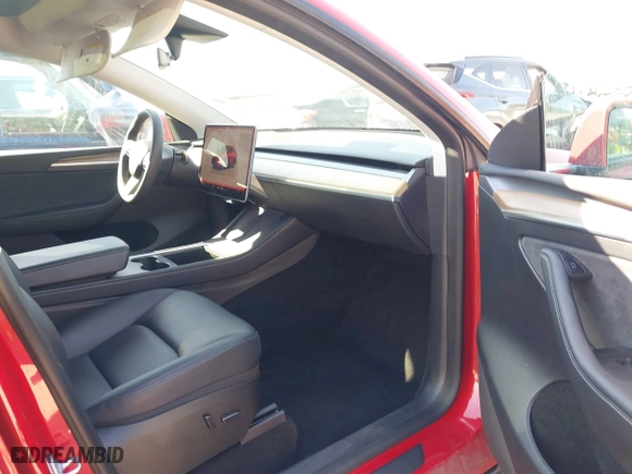 2023 Tesla Model Y Long Range with VIN 7SAYGDEE6PA040783, listed as a IAAI auction lot 41878236 with 32,436 mi miles. Bid and sale history available at carsss.com. Image 5.