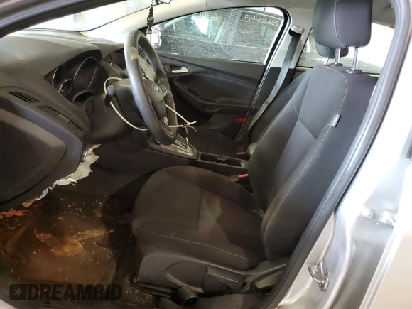 2017 Ford Focus SE with VIN 1FADP3F25HL308871, listed as a Copart auction lot 59723425 with 145,293 mi miles and Salvage title. Bid and sale history available at DreamBid. Image 7.