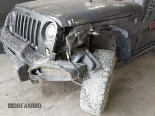 2017 Jeep Wrangler Unlimited Sahara with VIN 1C4BJWEG8HL638067, listed as a IAAI auction lot 41274352 with 57,339 mi miles. Bid and sale history available at carsss.com. Image 6.