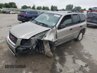 2003 GMC Envoy SLE с VIN 1GKDS13SX32373591, выставлен на аукционе Copart как лот 59727145 с пробегом 107 376 миль миль и Списание • Salvage title. История ставок и продаж доступна на DreamBid. Изображение 1.