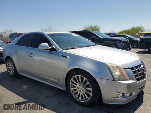 2013 Cadillac CTS Premium with VIN 1G6DP5E3XD0124816, listed as a Copart auction lot 57612365 with 180,713 mi miles and Salvage title. Bid and sale history available at DreamBid. Image 4.