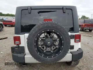2013 Jeep Wrangler Sahara with VIN 1C4AJWBGXDL579341, listed as a Copart auction lot 55970815 with 105,961 mi miles and Salvage title. Bid and sale history available at DreamBid. Image 6.