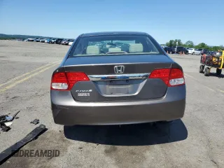 2009 Honda Civic LX z VIN 19XFA16559E020457, wystawiony jako Copart lot #58721185 z przebiegiem Nie podano mil oraz Szkoda całkowita • Salvage title. Historia ofert i sprzedaży dostępna na DreamBid. Obrazek 6.