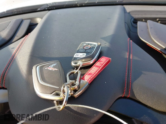 2023 Chevrolet Corvette 1LT z VIN 1G1YA2D48P5130350, wystawiony jako IAAI lot #41679244 z przebiegiem 7 927 mil mil oraz . Historia ofert i sprzedaży dostępna na DreamBid. Obrazek 11.