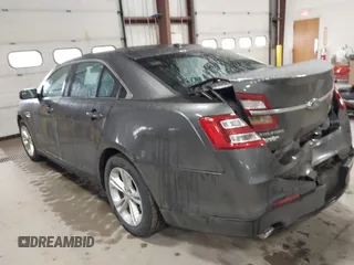 2015 Ford Taurus SEL with VIN 1FAHP2E87FG207029, listed as a IAAI auction lot 41752890 with 119,858 mi miles and . Bid and sale history available at carsss.com. Image 3.