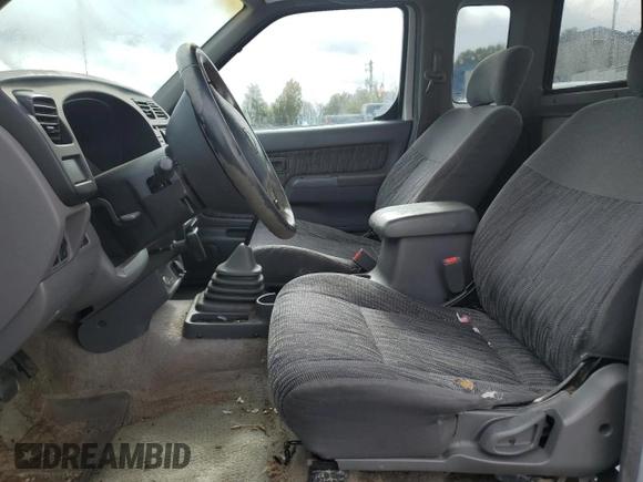 2000 Nissan Frontier XE with VIN 1N6ED26T0YC314102, listed as a Copart auction lot 83678264 with 174,419 mi miles and Salvage title. Bid and sale history available at DreamBid. Image 7.