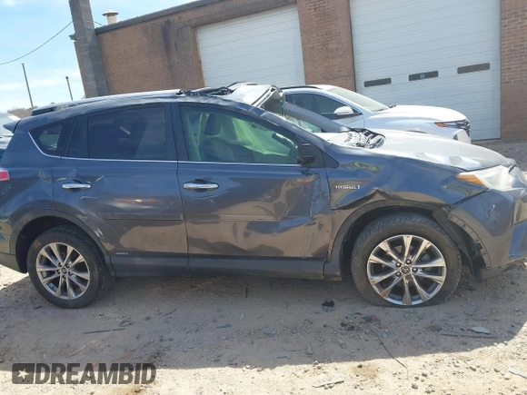 2016 Toyota RAV4 Hybrid Limited with VIN JTMDJREV7GD047729, listed as a IAAI auction lot 41833765 with 114,830 mi miles. Bid and sale history available at carsss.com. Image 13.