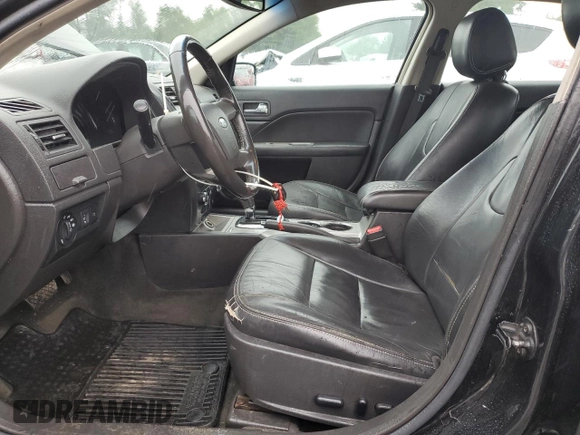 2012 Ford Fusion SEL with VIN 3FAHP0JA1CR348101, listed as a Copart auction lot 60995195 with 147,212 mi miles and Clean title. Bid and sale history available at DreamBid. Image 7.