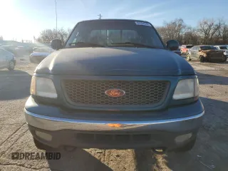 2000 Ford F-150 XL with VIN 1FTRX18W5YNB91950, listed as a Copart auction lot 84654584 with 0 mi miles and Salvage Title. Bid and sale history available at carsss.com. Image 5.