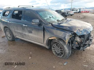 2013 Dodge Durango Crew z VIN 1C4RDJDG9DC682695, wystawiony jako IAAI lot #41133240 z przebiegiem 163 300 mil mil oraz . Historia ofert i sprzedaży dostępna na DreamBid. Obrazek 1.