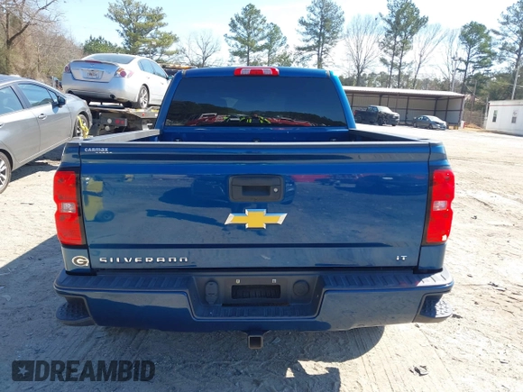 2018 Chevrolet Silverado 1500 LT with VIN 3GCUKREC9JG211391, listed as a IAAI auction lot 41710886 with 113,989 mi miles. Bid and sale history available at carsss.com. Image 16.