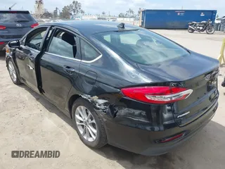 2020 Ford Fusion SE z VIN 3FA6P0LU7LR170922, wystawiony jako IAAI lot #42121025 z przebiegiem 115 799 mil mil oraz . Historia ofert i sprzedaży dostępna na DreamBid. Obrazek 3.