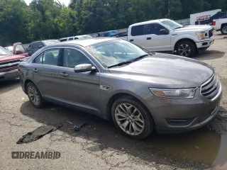 2014 Ford Taurus Limited with VIN 1FAHP2F84EG149622, listed as a Copart auction lot 63764675 with 208,801 mi miles and Salvage title. Bid and sale history available at DreamBid. Image 4.