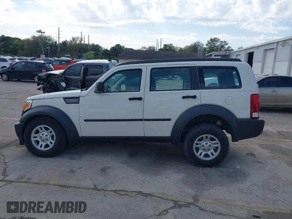 2008 Dodge Nitro SXT z VIN 1D8GT28K98W113494, wystawiony jako IAAI lot #41728030 z przebiegiem 31 397 mil mil oraz . Historia ofert i sprzedaży dostępna na DreamBid. Obrazek 14.