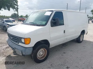 2007 Ford Econoline Cargo Commercial with VIN 1FTNE24W27DA99831, listed as a IAAI auction lot 42292439 with 280,756 mi miles and . Bid and sale history available at DreamBid. Image 2.