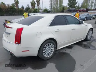 2010 Cadillac CTS Luxury with VIN 1G6DE5EG4A0133693, listed as a IAAI auction lot 42047756 with Not Provided miles. Bid and sale history available at carsss.com. Image 4.