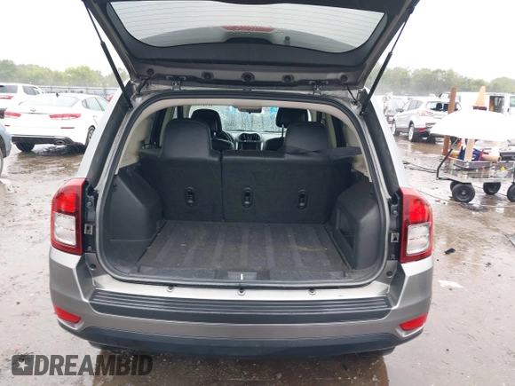 2014 Jeep Compass Latitude with VIN 1C4NJCEB2ED522109, listed as a IAAI auction lot 40282558 with 168,954 mi miles and . Bid and sale history available at carsss.com. Image 8.
