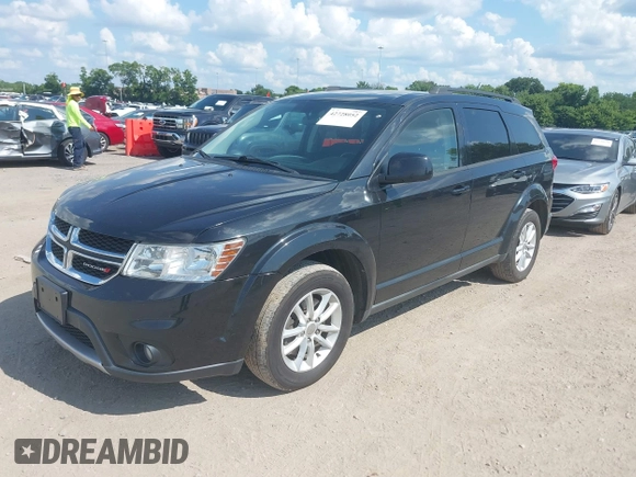 2013 Dodge Journey SXT with VIN 3C4PDDBG1DT615217, listed as a IAAI auction lot 42728052 with 234,347 mi miles and . Bid and sale history available at DreamBid. Image 2.