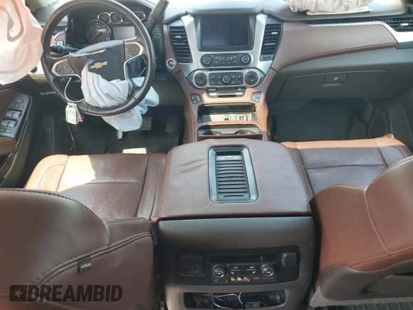 2015 Chevrolet Tahoe LTZ с VIN 1GNSCCKC0FR708625, выставлен на аукционе Copart как лот 57563325 с пробегом 139 616 миль миль и Списание • Salvage title. История ставок и продаж доступна на DreamBid. Изображение 8.